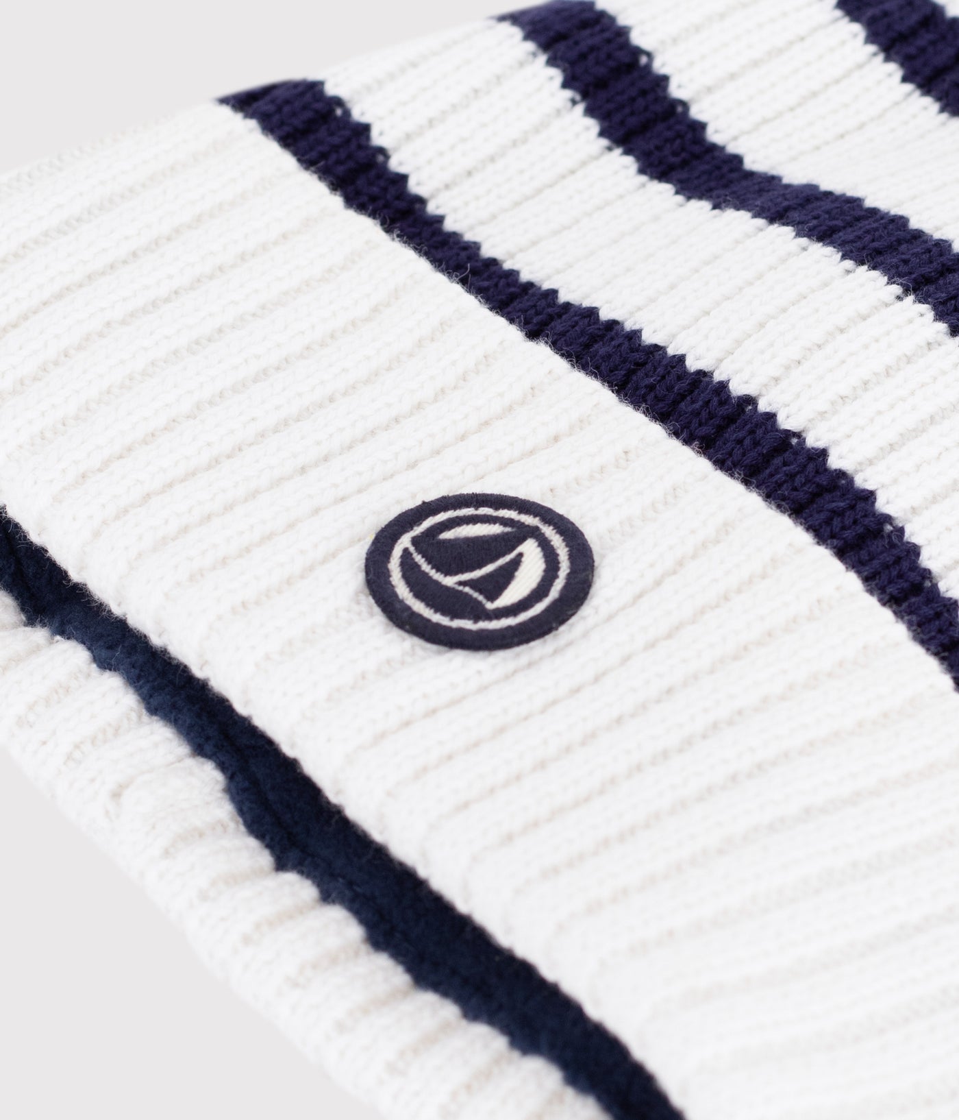 CHILDREN'S STRIPY KNITTED BEANIE HAT LINED IN POLAR FLEECE