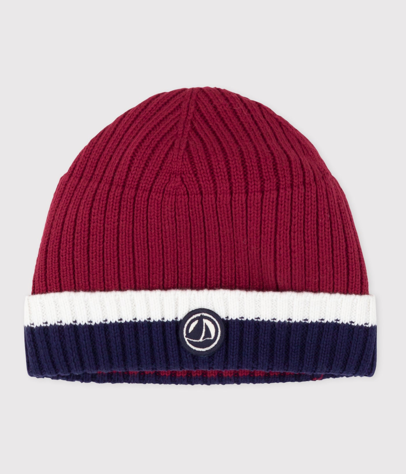 BABIES' KNITTED BEANIE WITH A FLEECE LINING