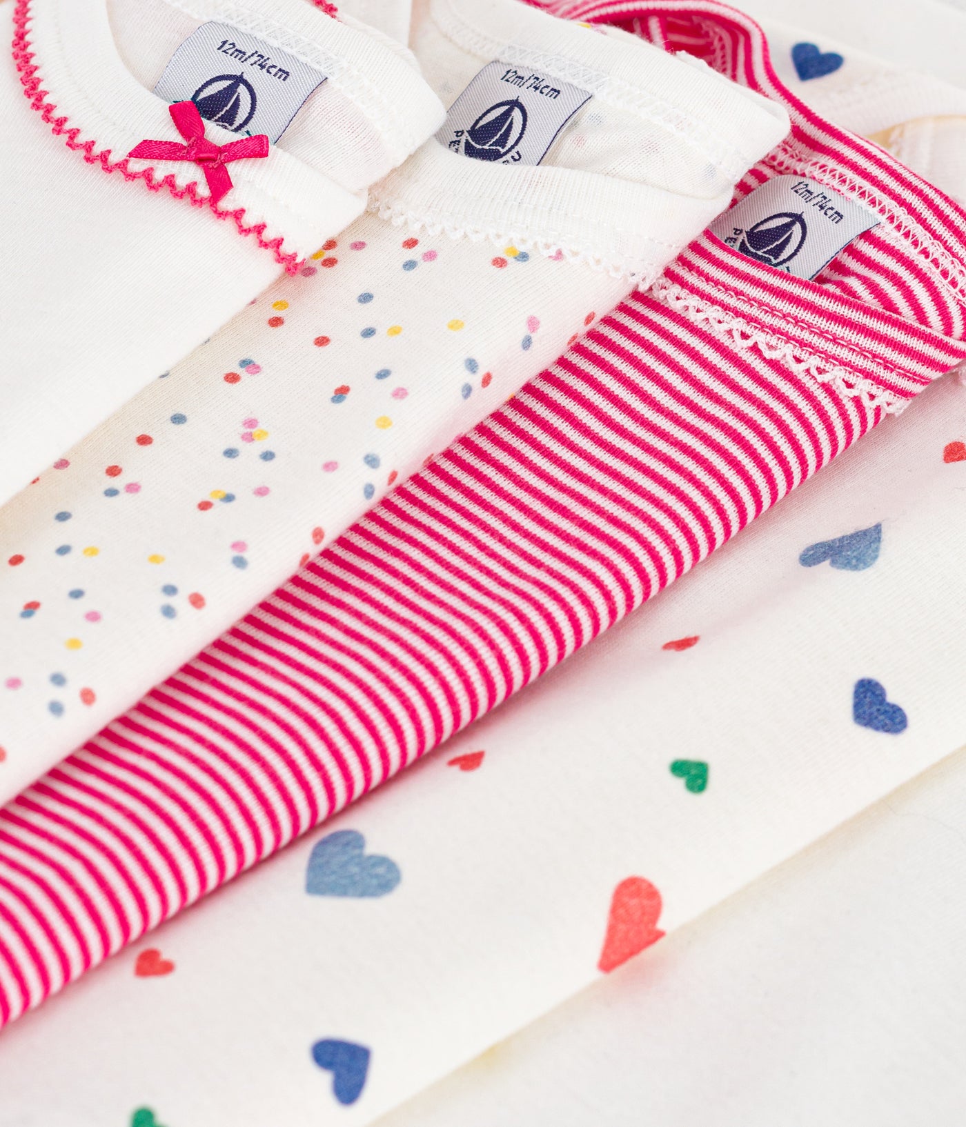 PACK OF LONG-SLEEVED HEART-PRINT COTTON BODIES FOR BABIES