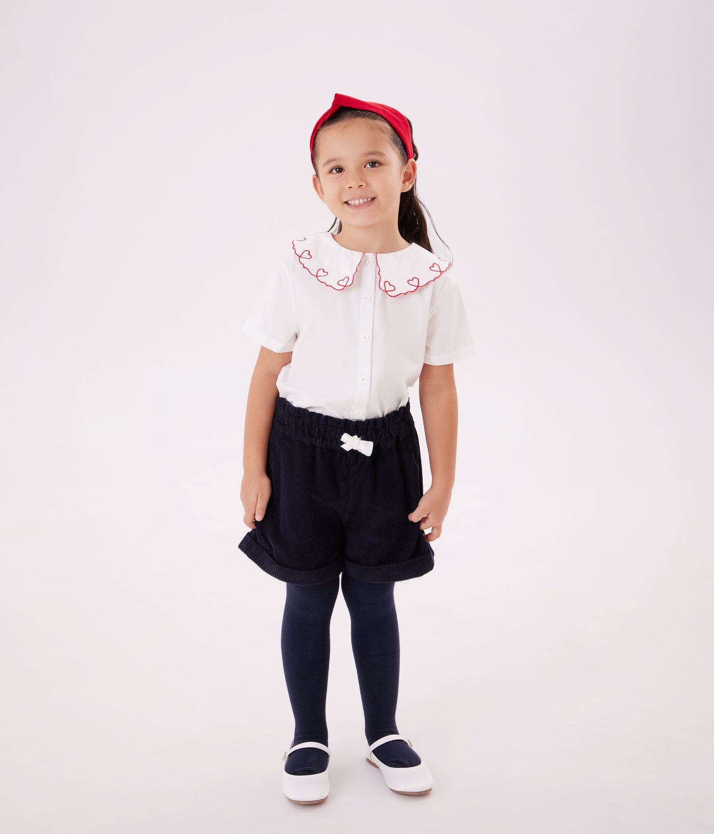 CHILDREN'S SHORT-SLEEVED BLOUSE IN PLAIN COTTON POPLIN.