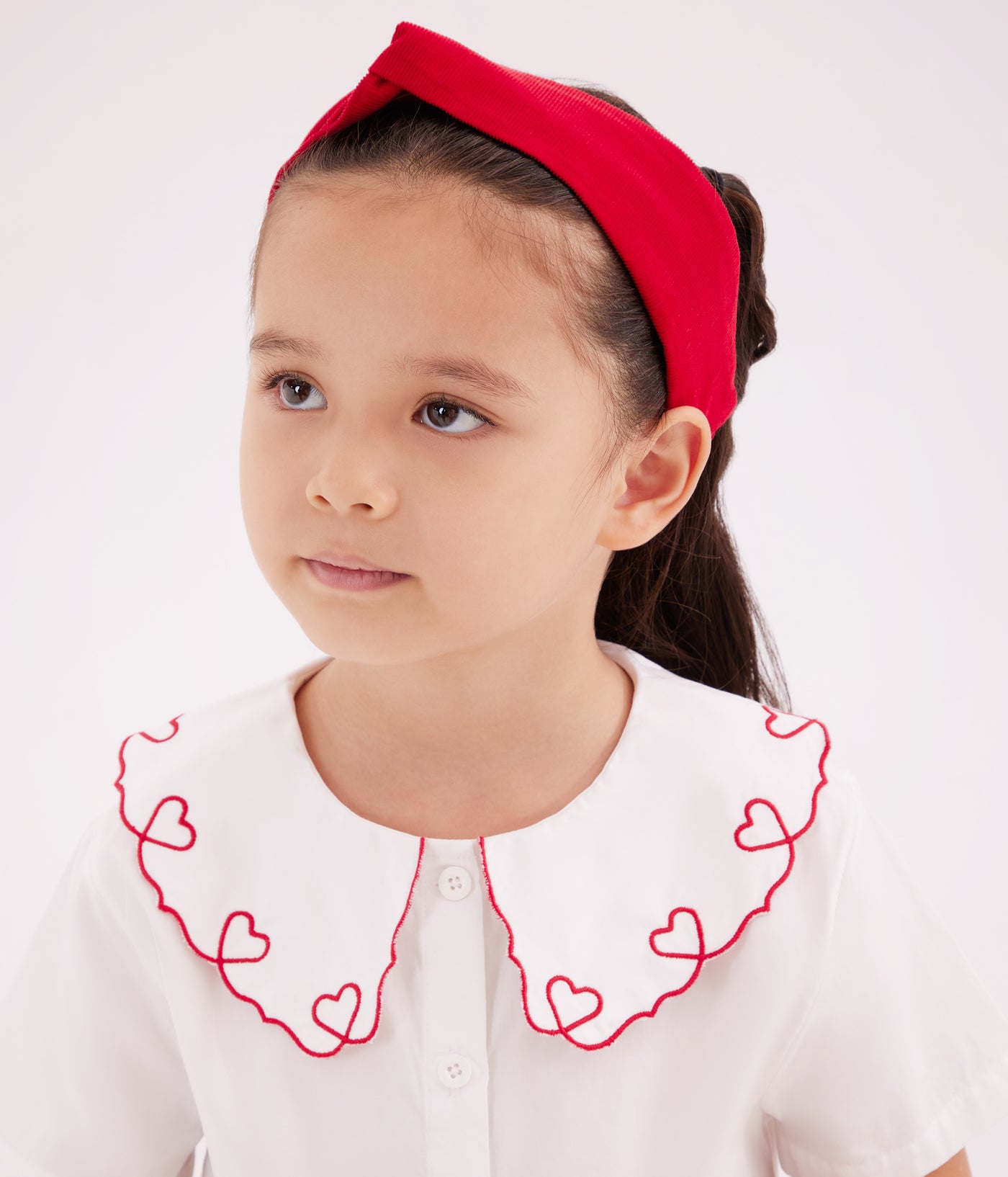 CHILDREN'S SHORT-SLEEVED BLOUSE IN PLAIN COTTON POPLIN.