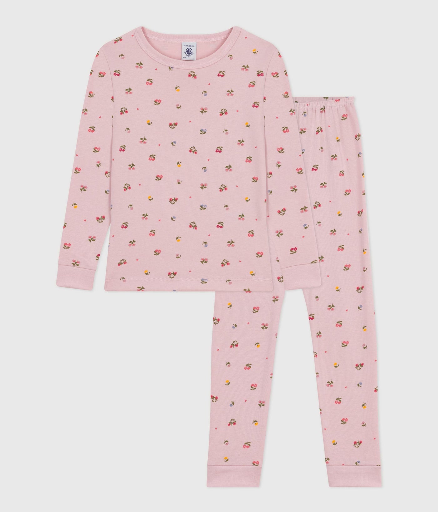 CHILDREN'S PYJAMAS IN COTTON WITH A FLOWER PRINT AND SNUG-FITTING LEGS