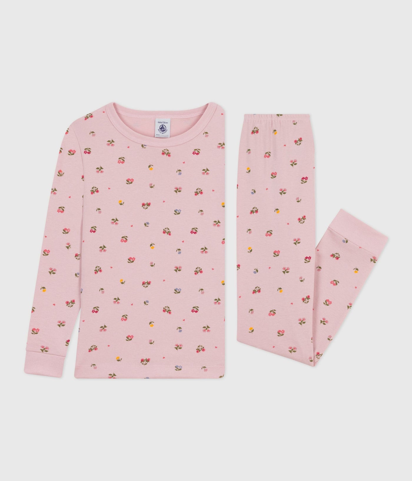 CHILDREN'S PYJAMAS IN COTTON WITH A FLOWER PRINT AND SNUG-FITTING LEGS