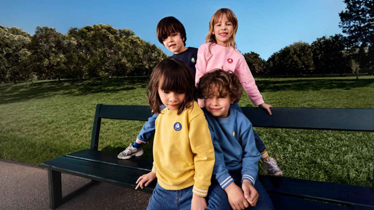 a group of children wearing sweatshirts